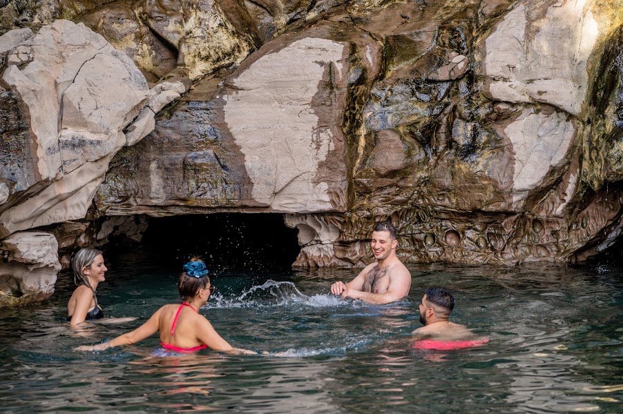 Aerial view of stone thermal pools with people